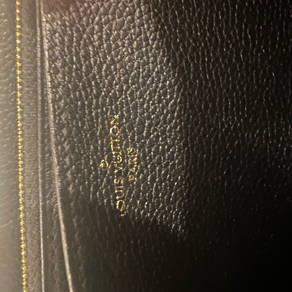 Authentic Louis Vuitton Black Zippy Wallet. 
Monogram Empreinte Leather. - Picture 10 of 16